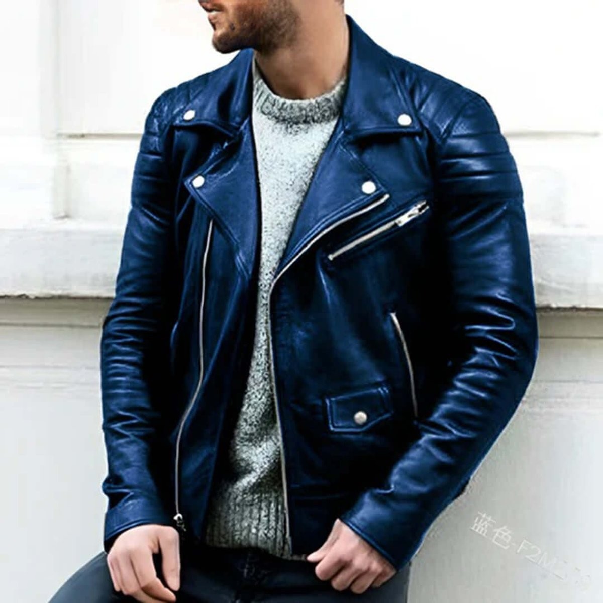 Navy faux leather biker jacket featuring notched lapel and zip pockets