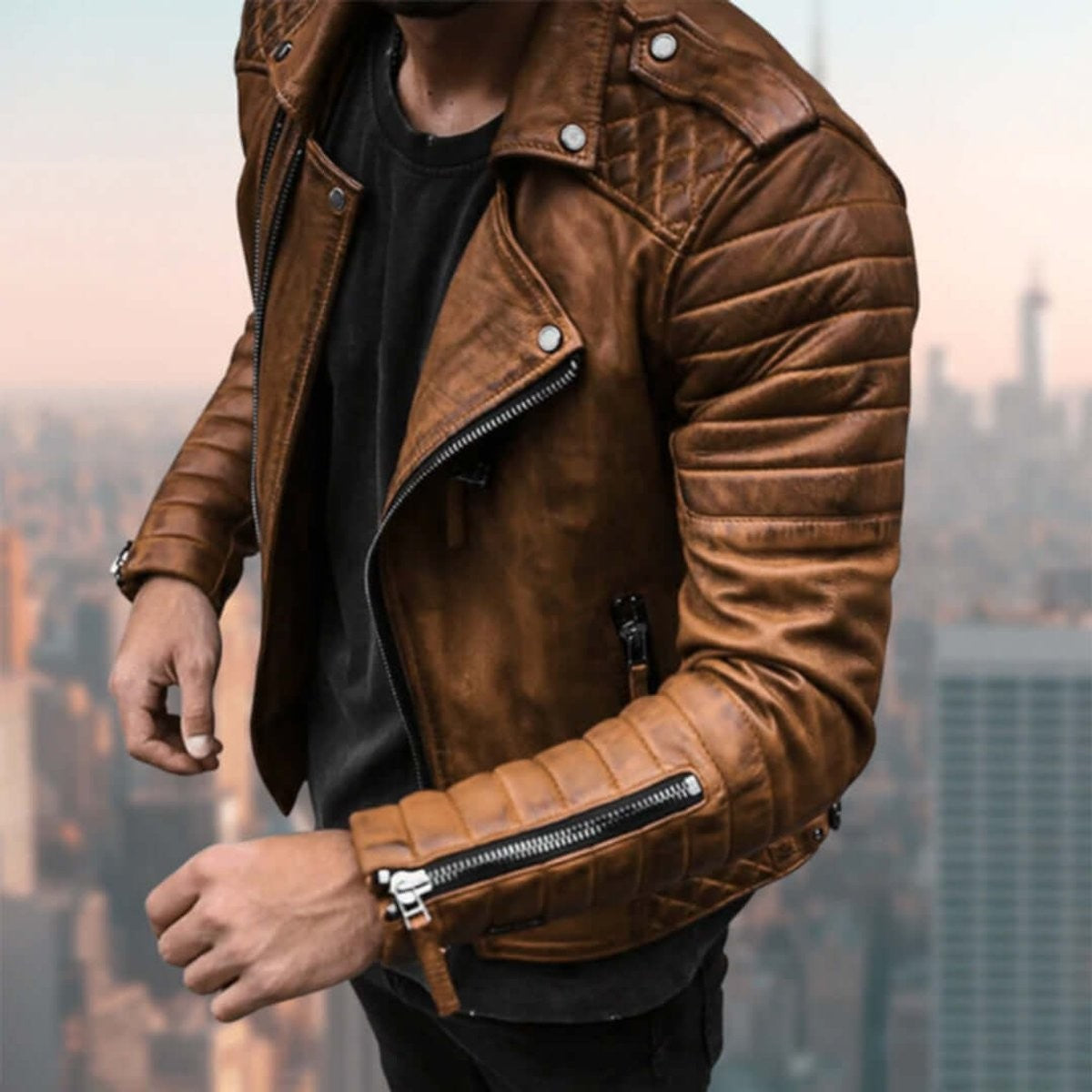 Tan faux leather biker jacket with quilted shoulders and ribbed sleeves