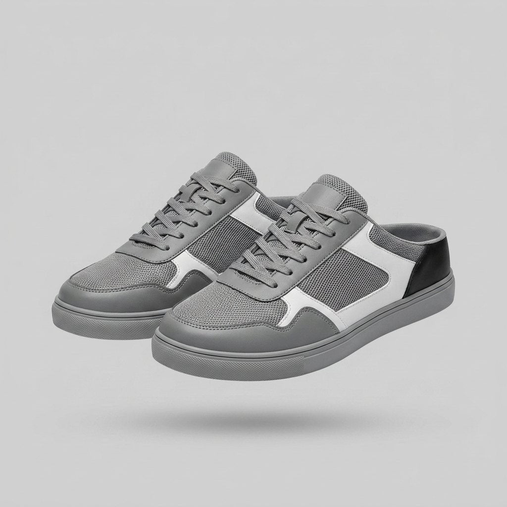 Grey backless trainer mules with white panel detailing