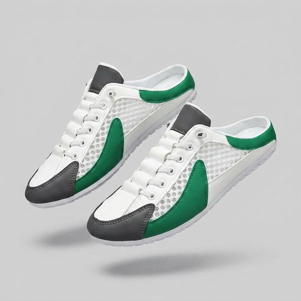 White mesh slip-on mules with green and grey accents