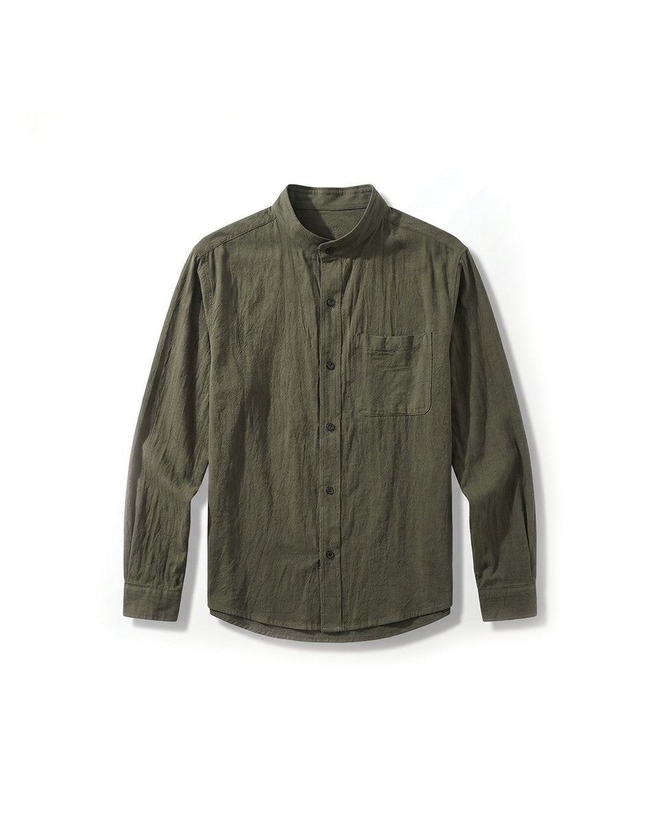 Khaki green grandad-collar shirt with chest pocket, laid flat in crinkled cotton