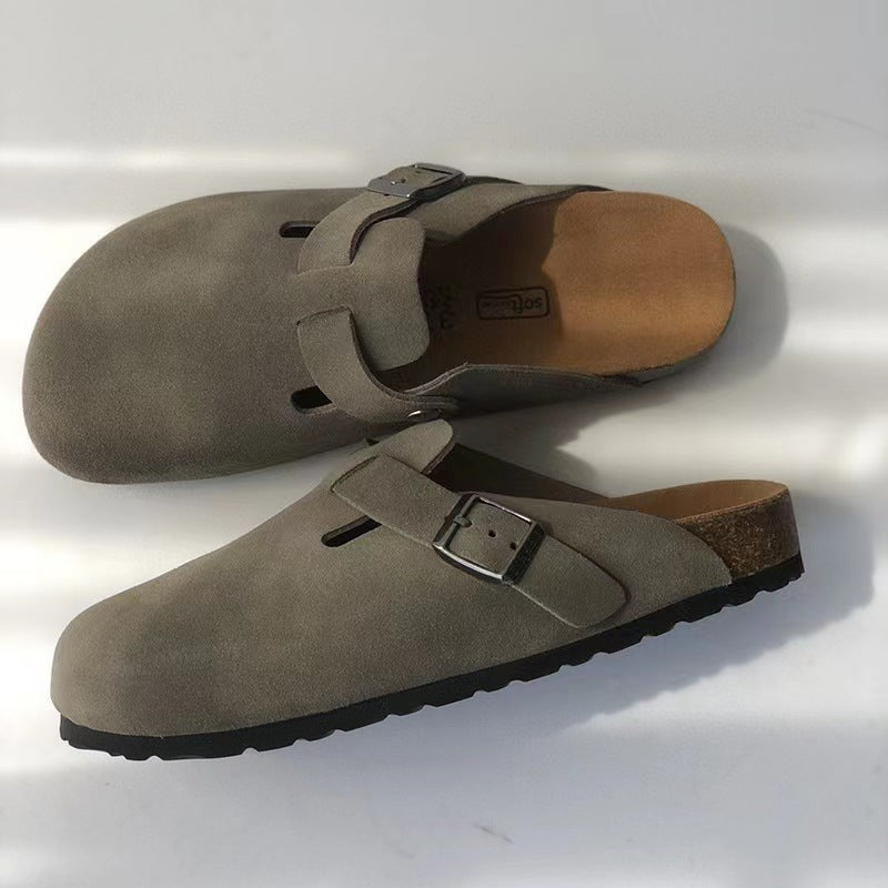 Pair of grey suede buckle clogs with cork sole detailing