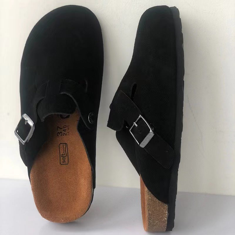 Black suede clog sandals with silver buckle and cork trim