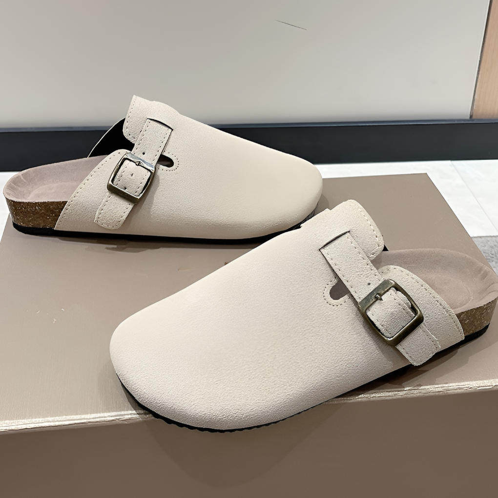 Cream faux suede buckle clogs with contrast cork sole