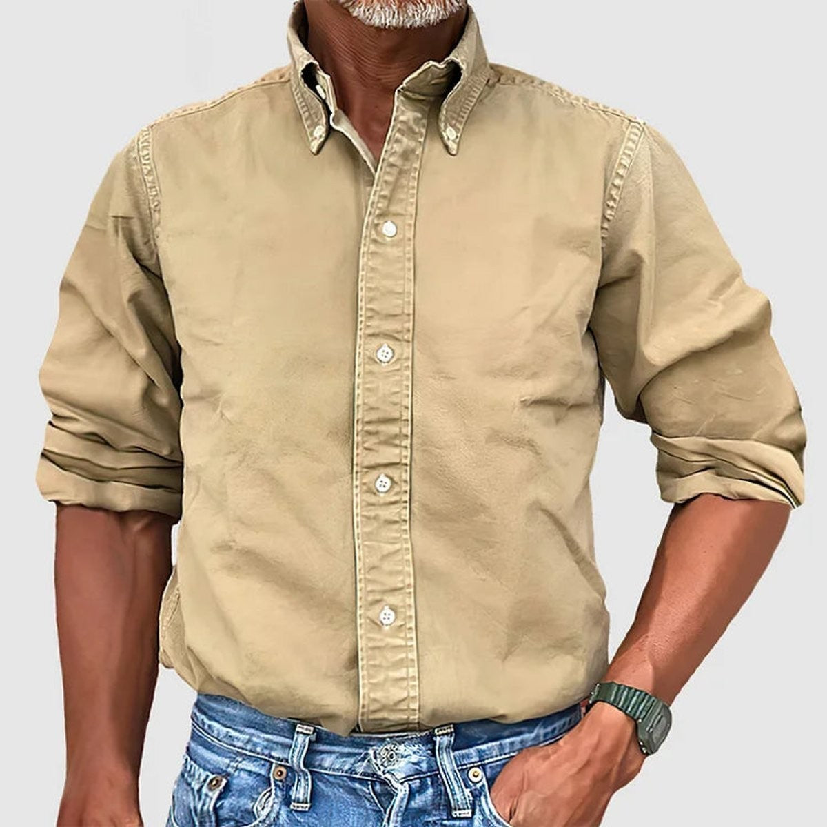 Khaki long-sleeve button-down shirt with button-fastened collar, worn casually
