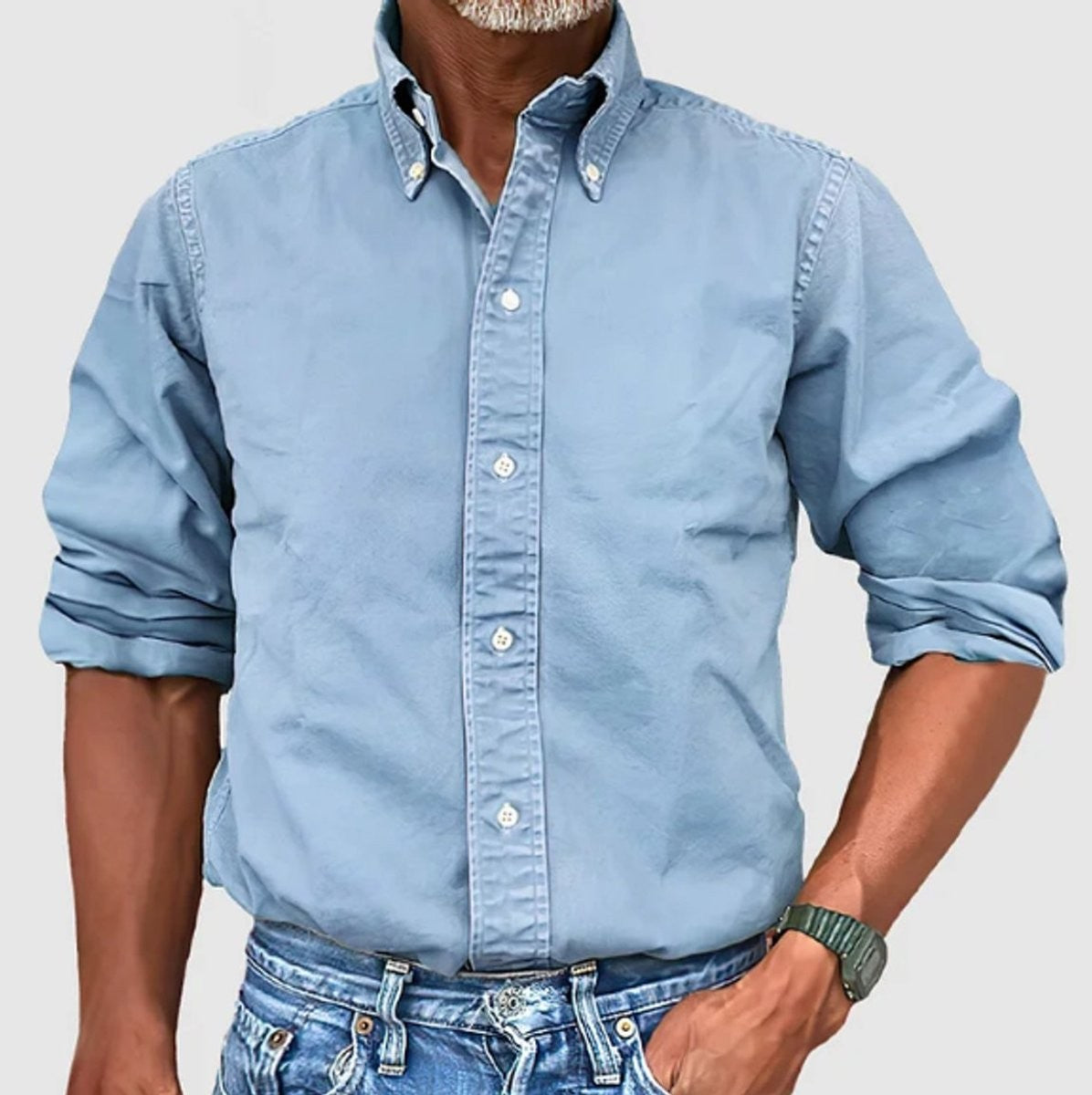 Pale blue cotton button-down shirt with rolled sleeves, casual styling