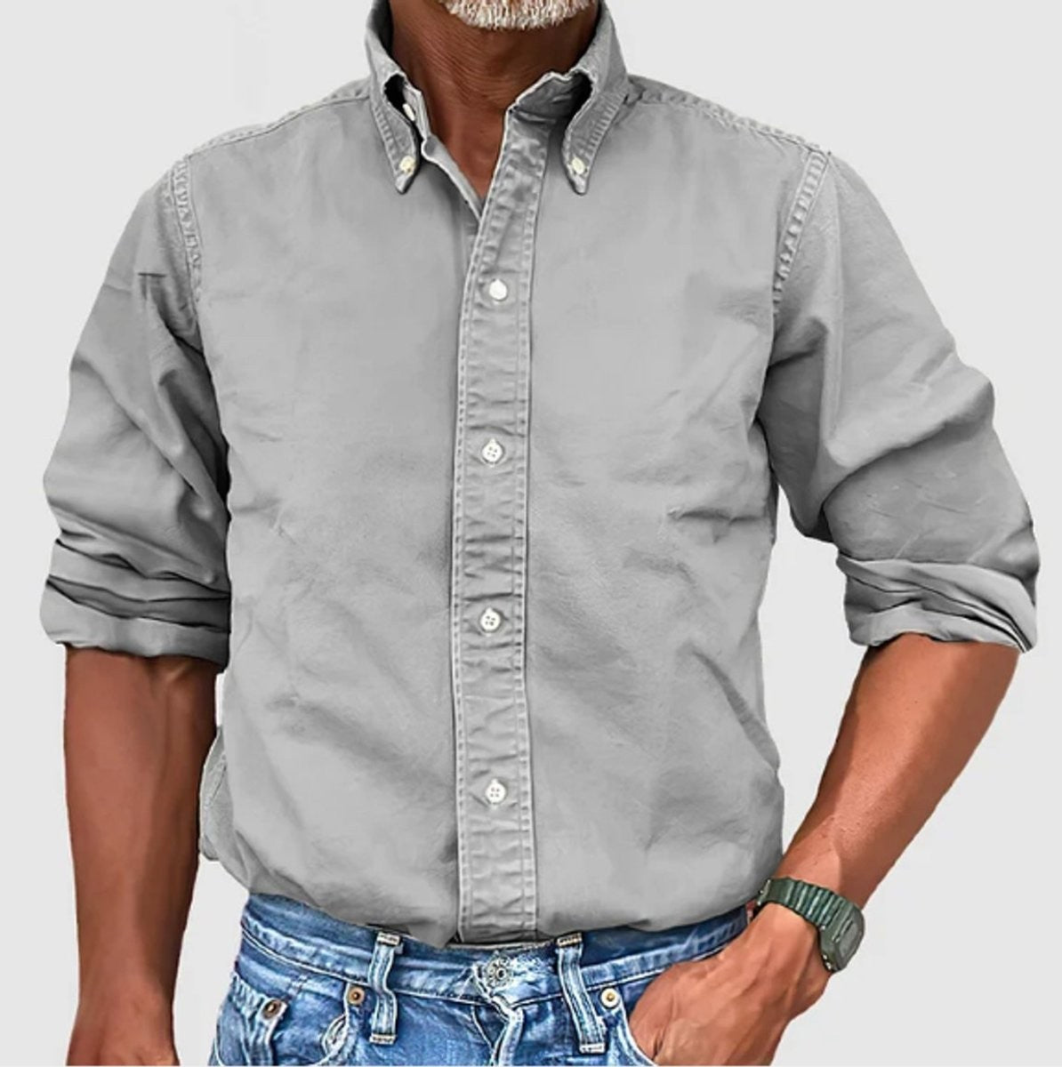 Light grey cotton button-down shirt with classic collar, worn untucked