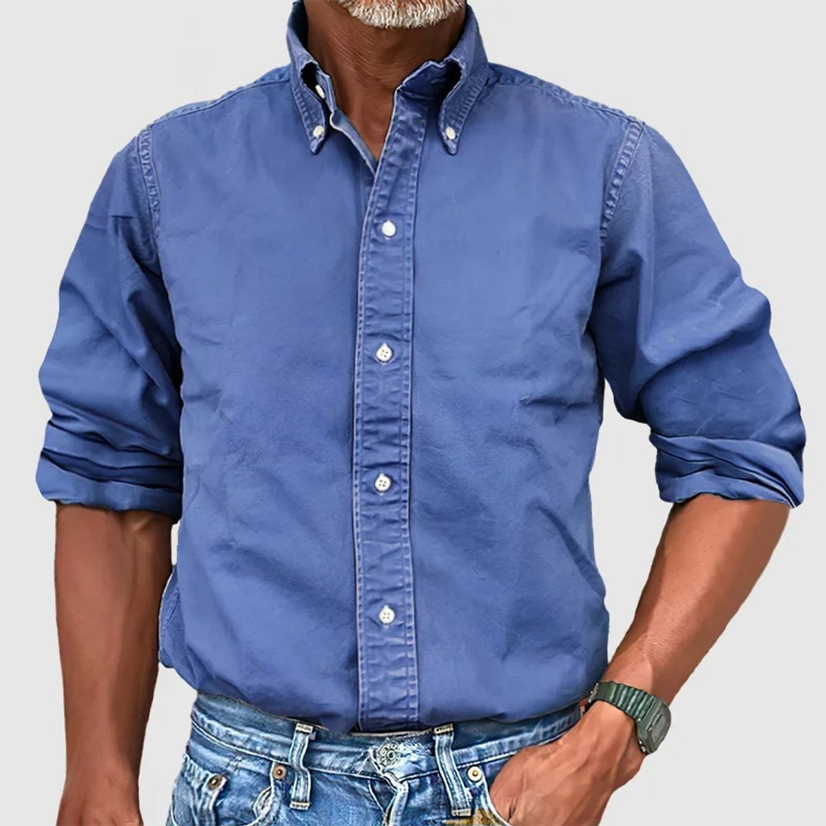 Denim blue long-sleeve shirt featuring button-down collar and relaxed fit
