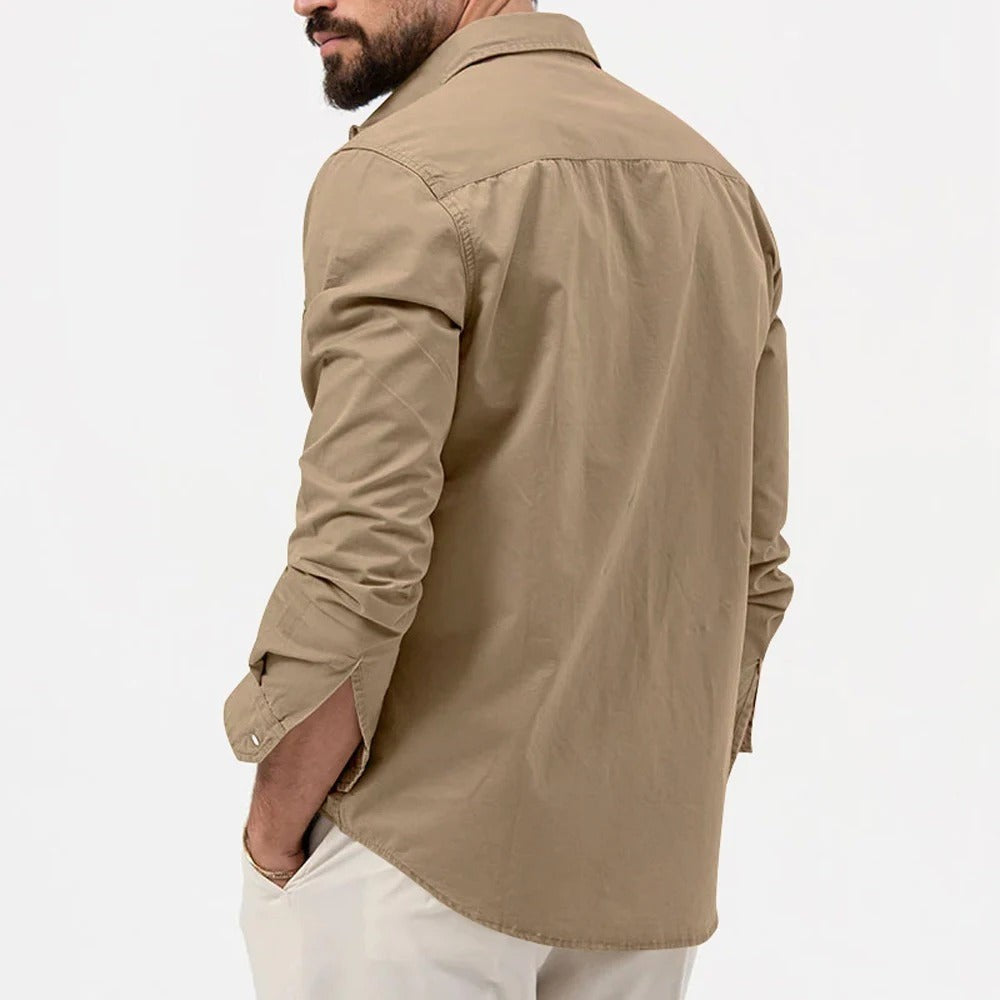Rear view of khaki button shirt showing back yoke seam and curved hem