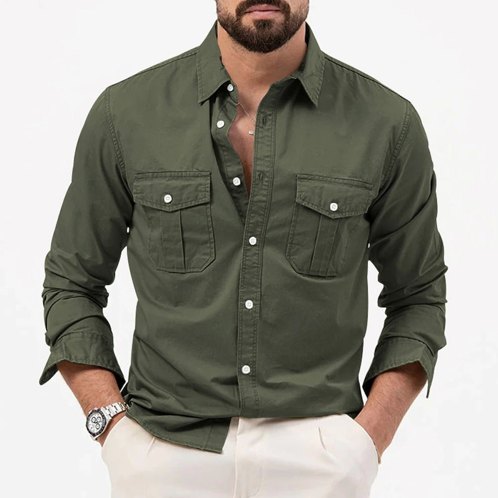 Olive green button-down shirt with utility chest pockets, worn open-neck