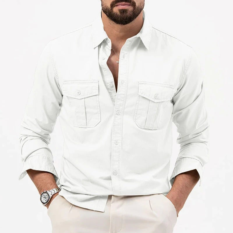 White cotton button-up shirt featuring flap pockets and rolled sleeves