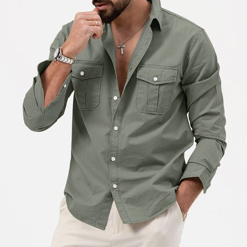 Sage green button-down shirt styled with rolled sleeve and open collar