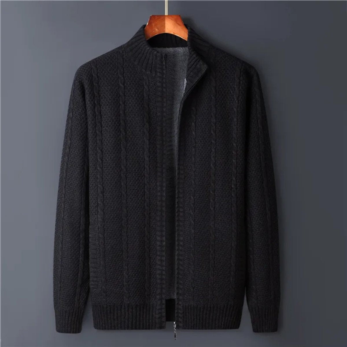 Black cable-knit full-zip cardigan jacket with fleece-lined interior