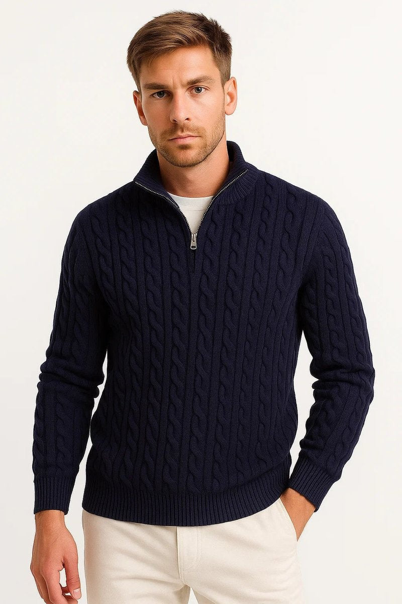 Navy cable-knit quarter-zip jumper worn with cream chinos