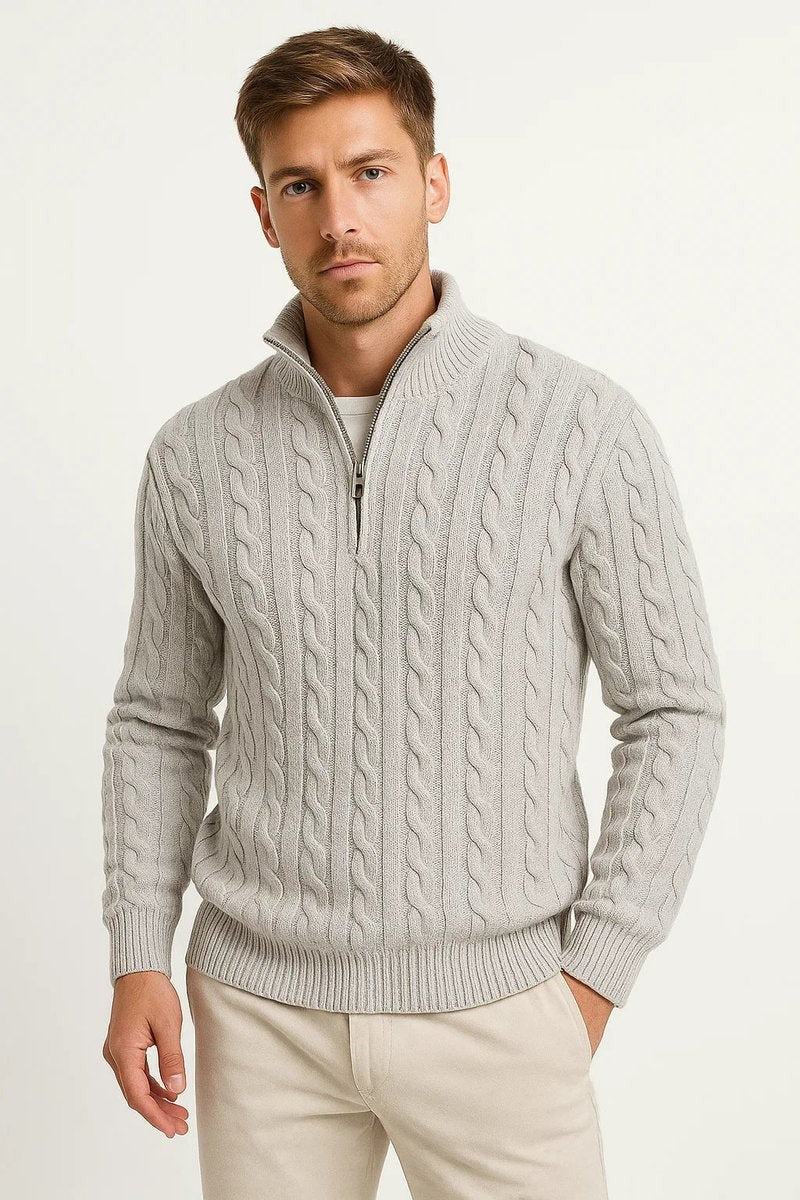 Light grey cable-knit quarter-zip jumper styled with beige trousers