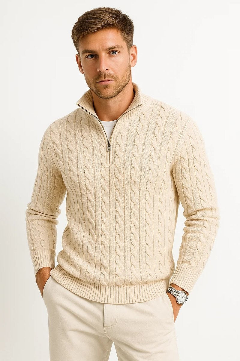 Cream cable-knit quarter-zip jumper worn with matching trousers