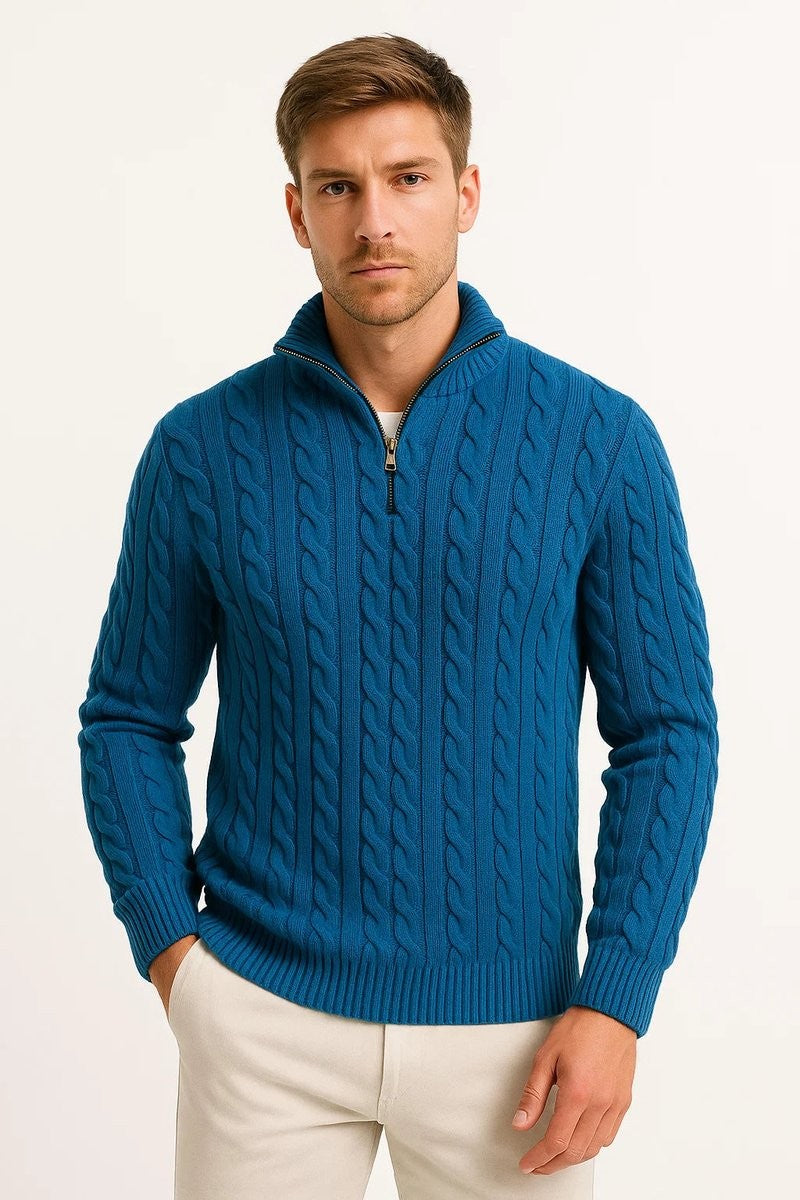 Teal cable-knit quarter-zip jumper worn over white T-shirt