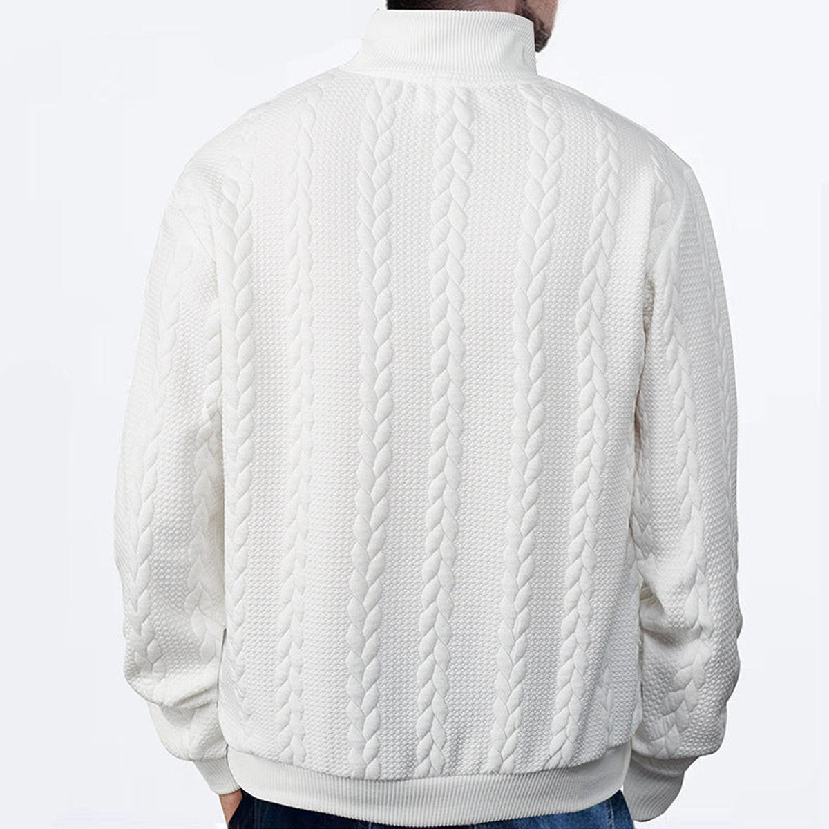 Model wearing white cable knit quarter-zip jumper, back view close-up