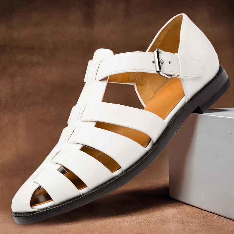 Men's white leather sandals featuring gladiator-style straps and silver buckle