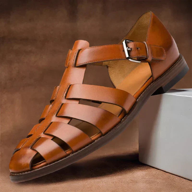 Tan leather fisherman sandals with woven straps and buckle detail