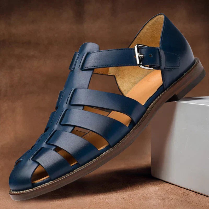 Navy leather caged sandals with silver buckle and closed toe