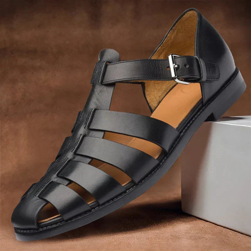 Black leather fisherman sandals with strappy design and buckle fastening