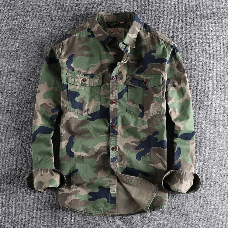 Men's camo print shirt with button-down collar laid flat on grey backdrop