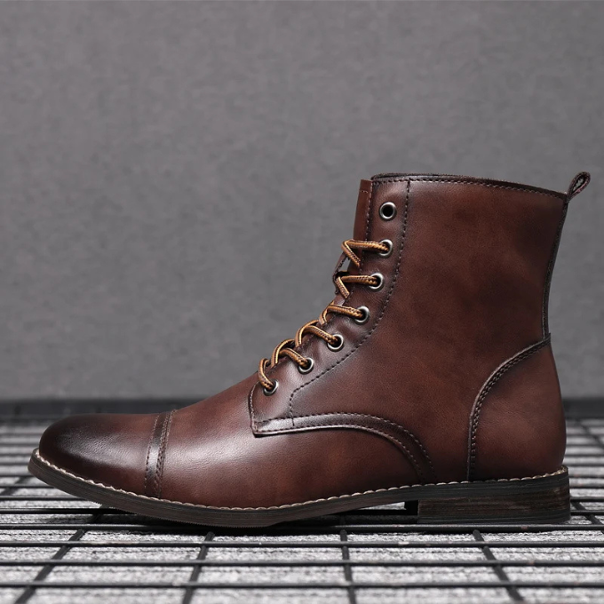 Dark brown leather cap-toe ankle boots with contrast lacing