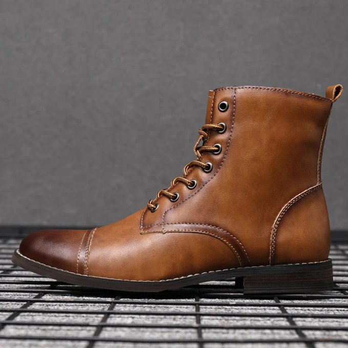 Tan leather lace-up ankle boots showing burnished toe finish