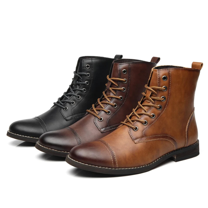 Black, dark brown and tan leather lace-up boots grouped together on white background