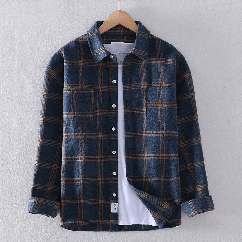 Blue tartan check button-up shirt featuring twin front pockets
