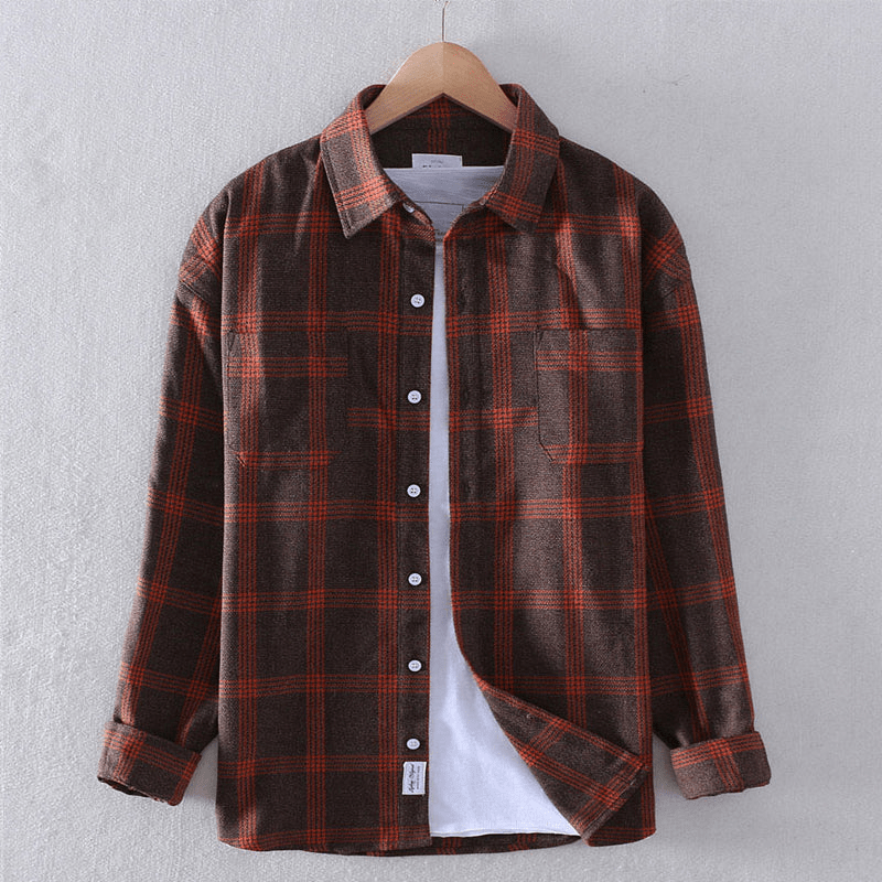 Rust and brown checked flannel shirt with long sleeves and button front