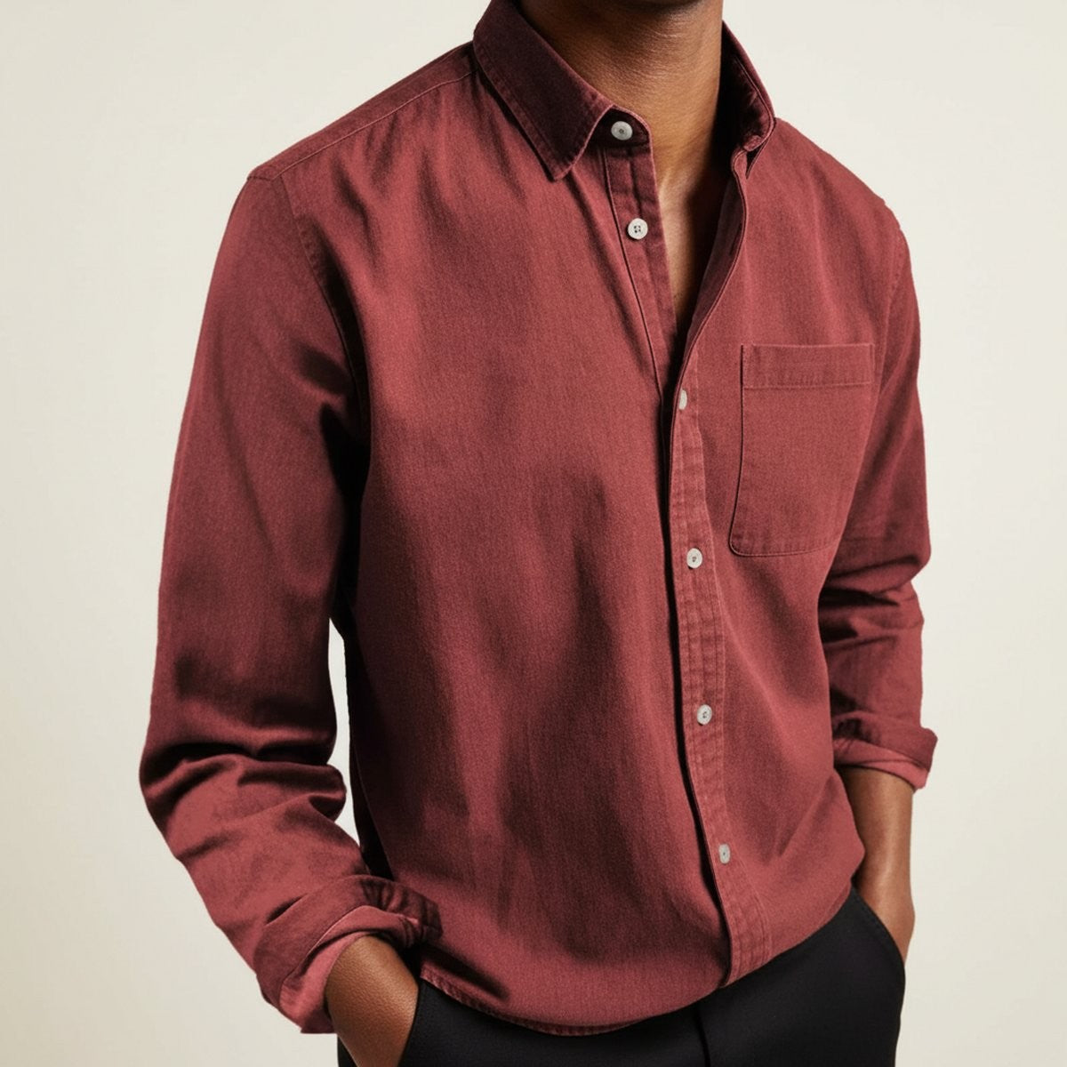 Burgundy long-sleeve flannel shirt with classic collar and chest pocket detail