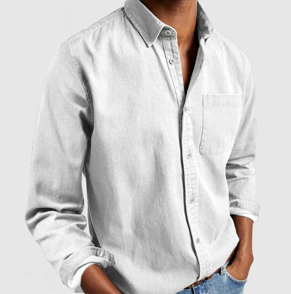 Light grey denim shirt with buttoned cuffs and chest pocket
