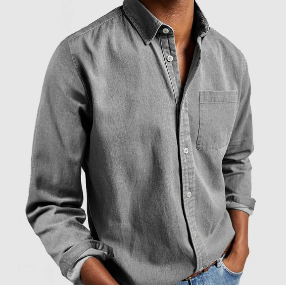 Grey denim shirt featuring long sleeves and buttoned front