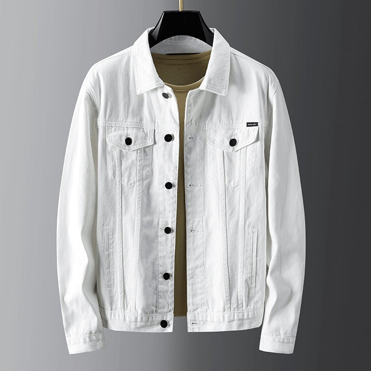 White denim jacket featuring stitched panels and dark button fastenings