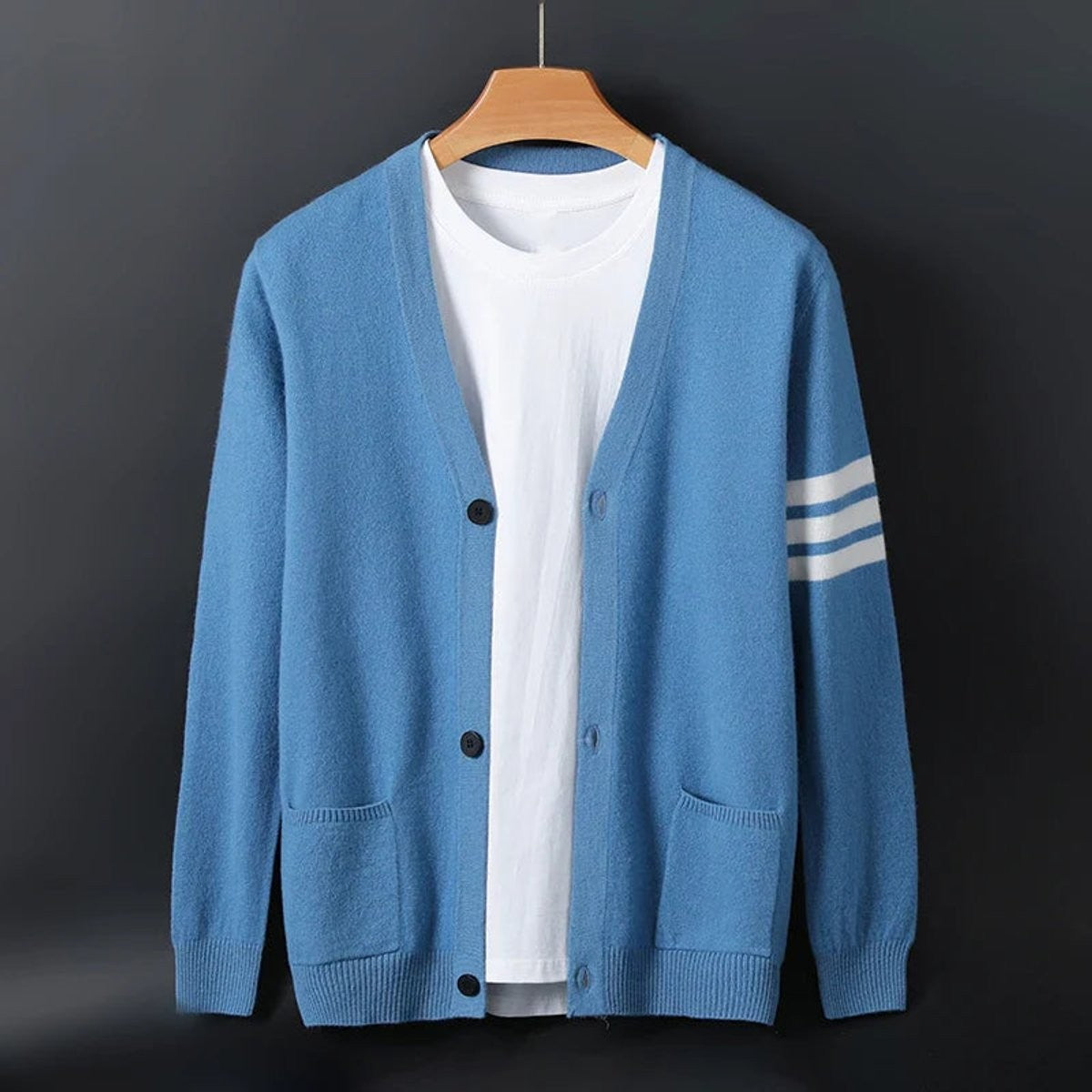 Blue knitted V-neck cardigan with white striped sleeve and button-front detail