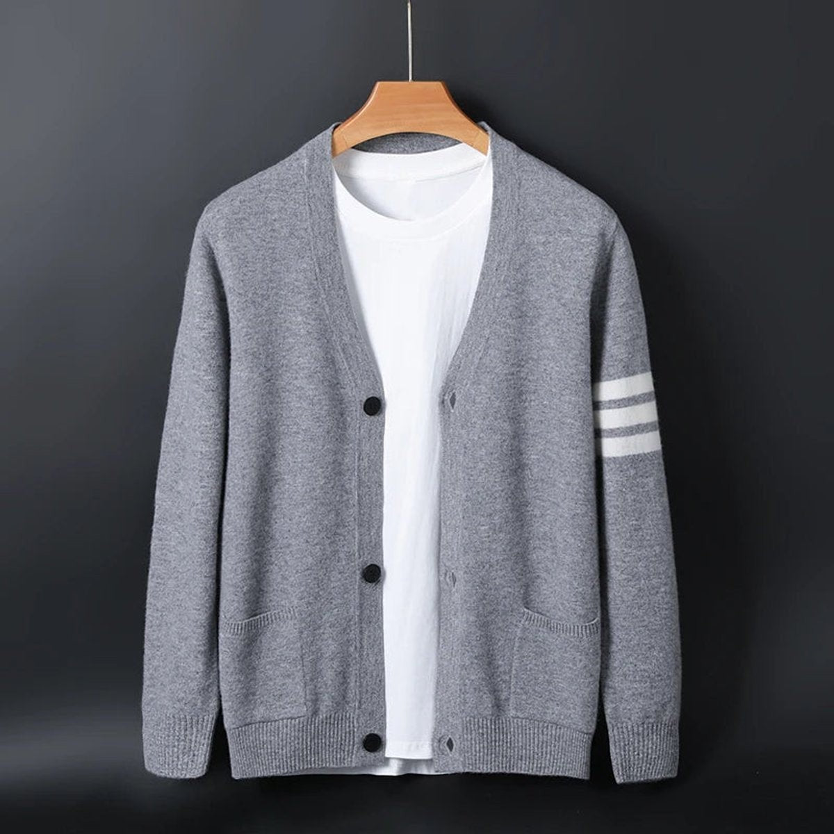 Grey V-neck cardigan with collegiate striped sleeve and ribbed hem