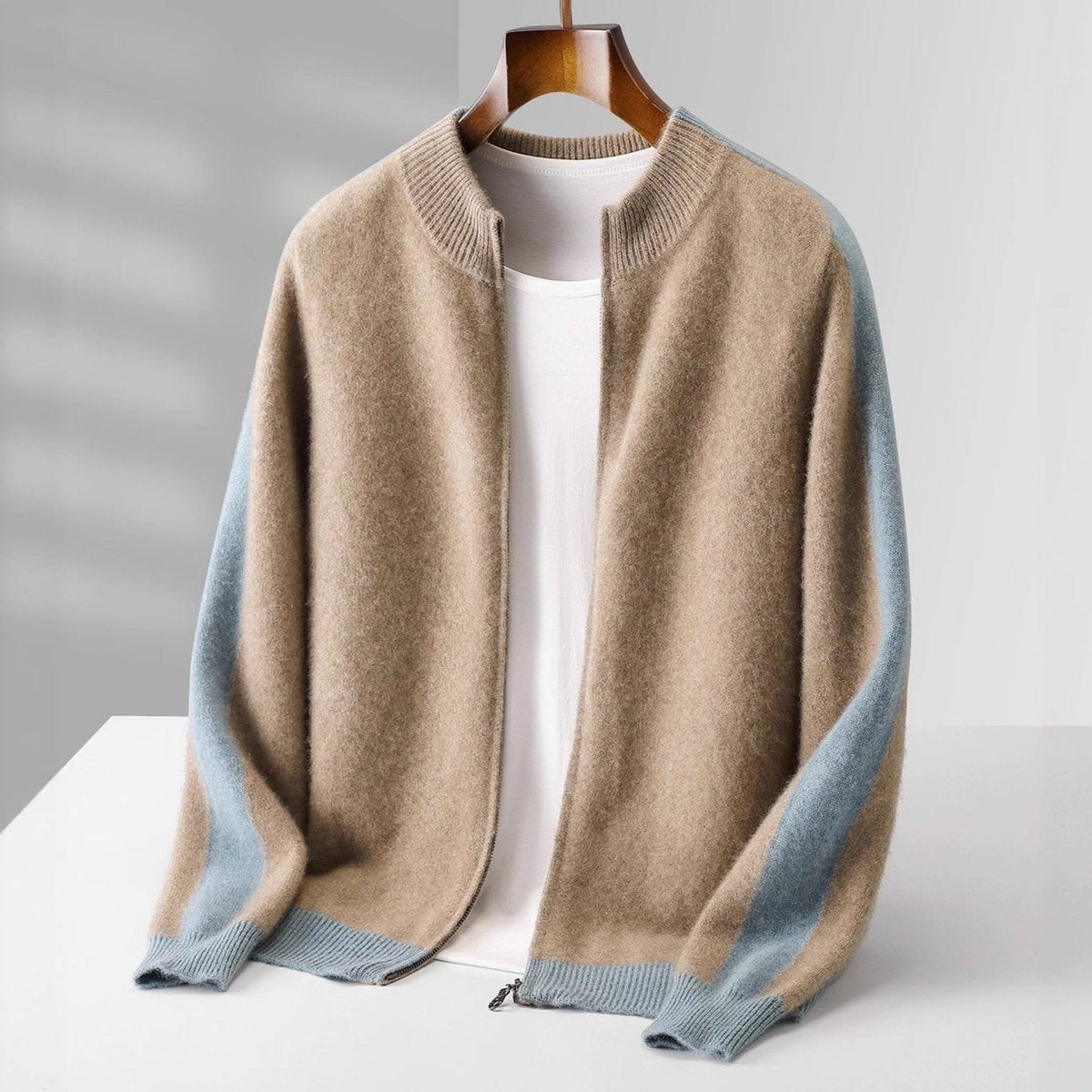 Camel zip-up cardigan with contrasting pale blue sleeve stripe and ribbed trim