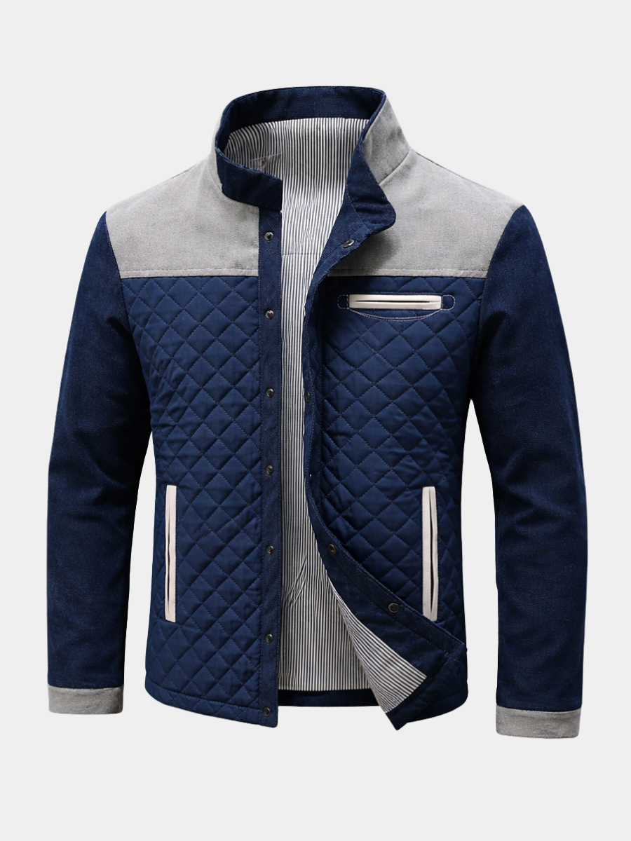 Navy quilted jacket with grey shoulder panels and stand collar, unbuttoned