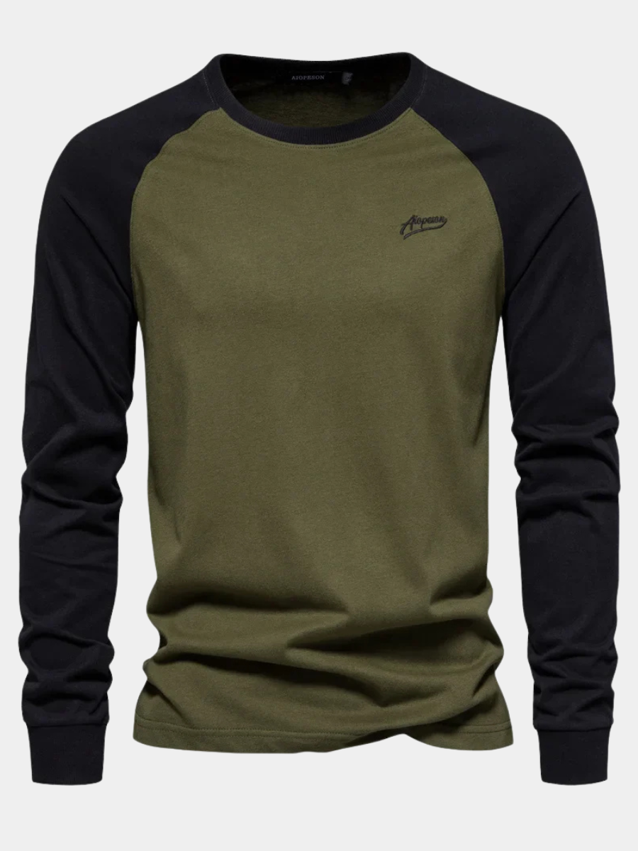 Khaki green raglan long sleeve top with contrasting black sleeves and crew neck
