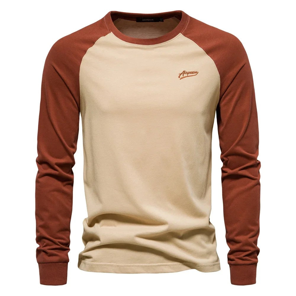 Beige raglan long sleeve top with rust-coloured contrast sleeves