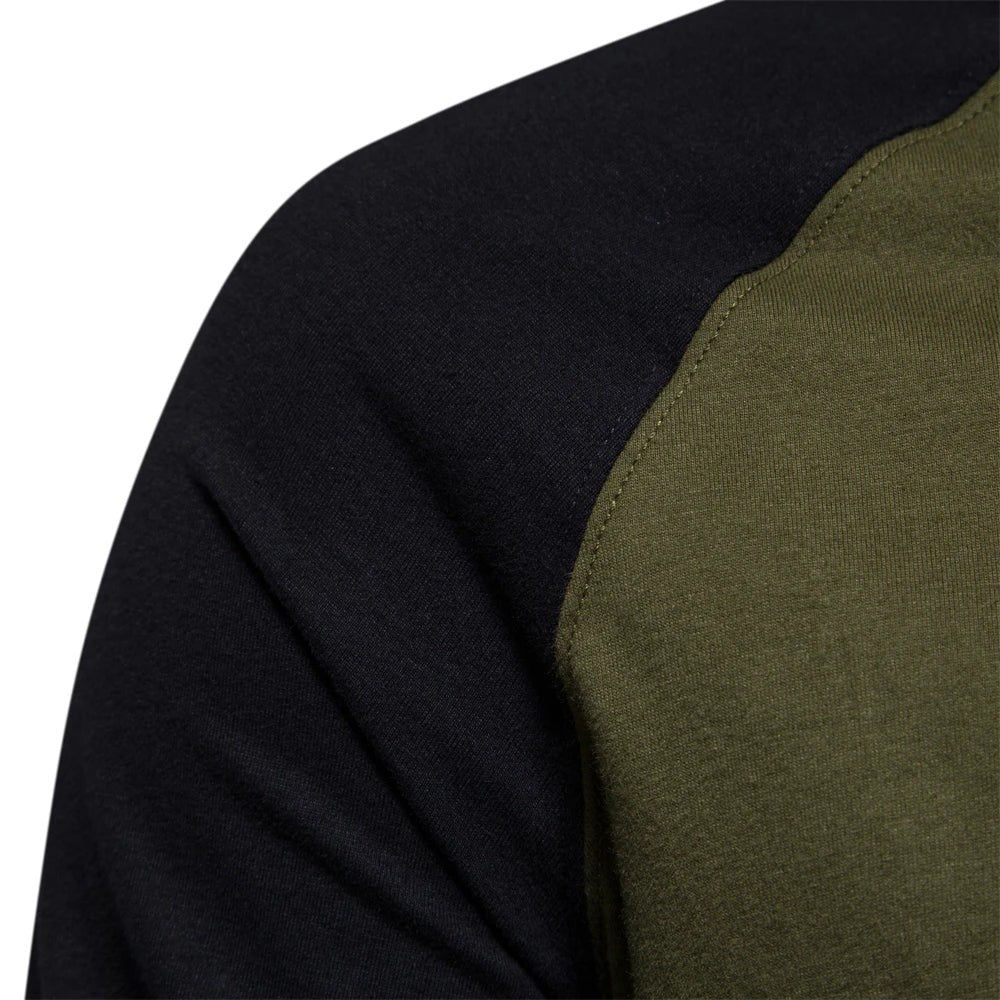 Close-up of raglan sleeve seam on khaki and black long sleeve top