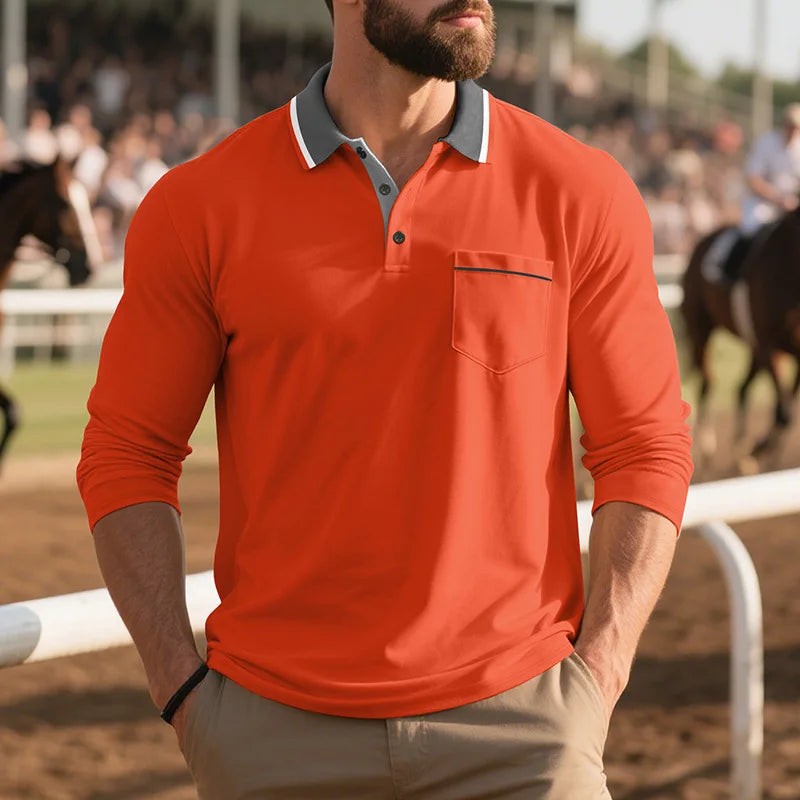 Orange polo shirt with contrast collar worn at outdoor racecourse setting