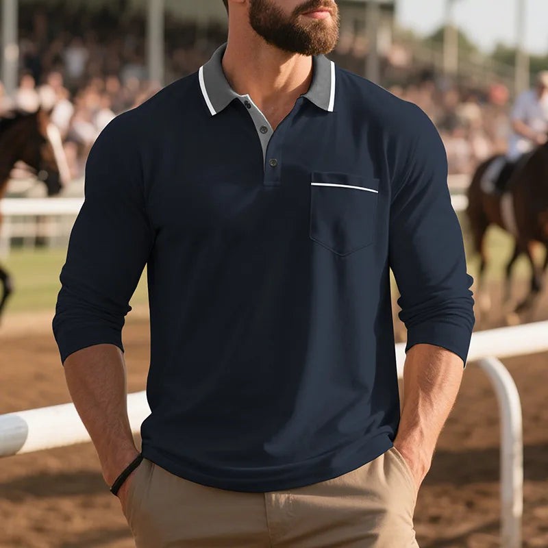 Navy polo shirt featuring contrast collar and chest pocket detailing