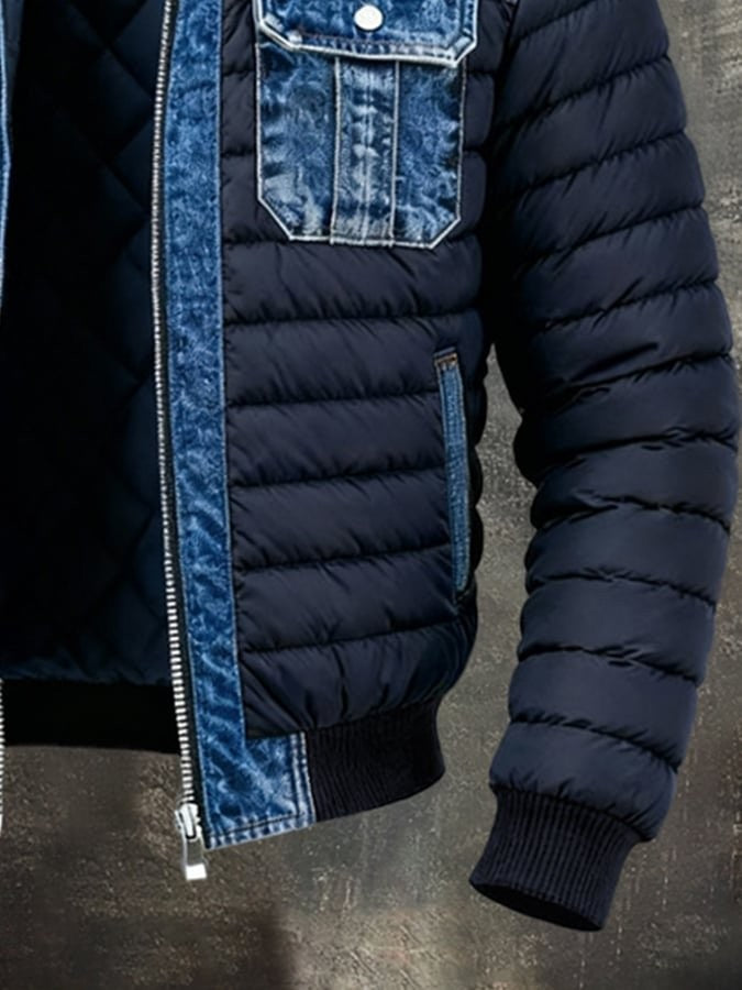 Close-up of quilted padding and denim trim detail on men's winter bomber jacket