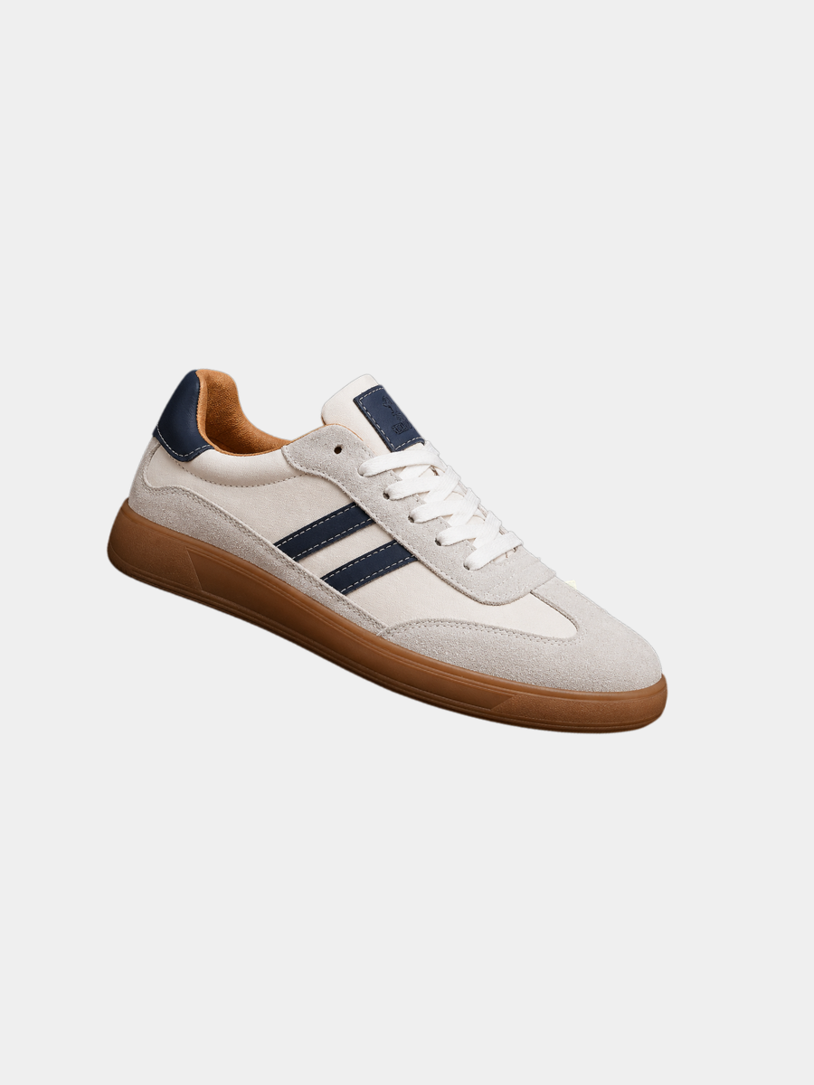 White suede trainer with navy stripes and gum sole