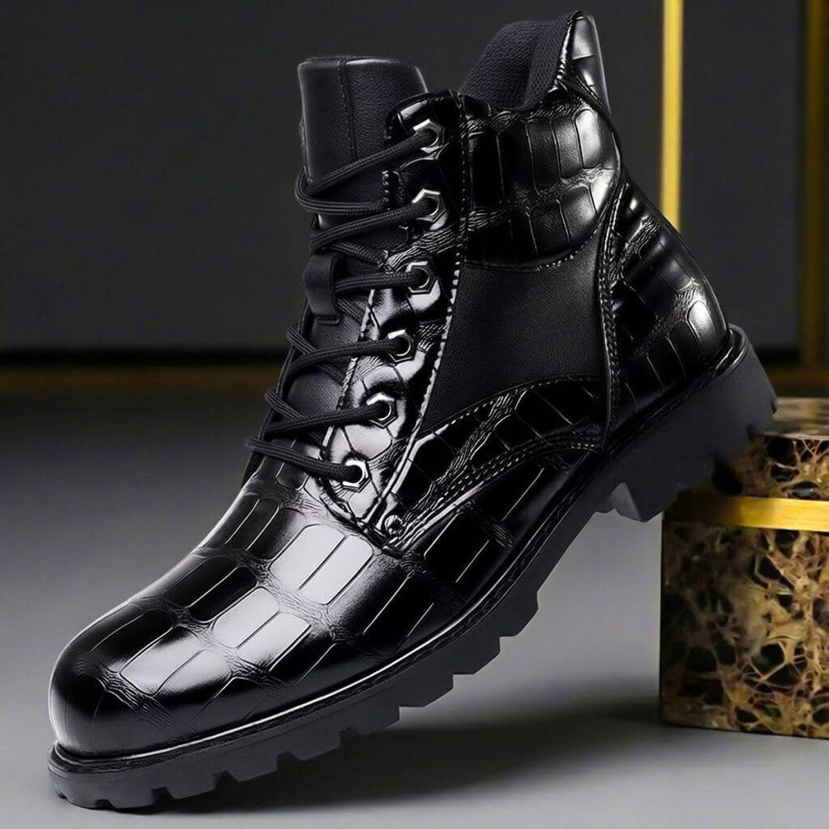 Black croc-embossed leather ankle boot featuring lace-up fastening and ridged sole