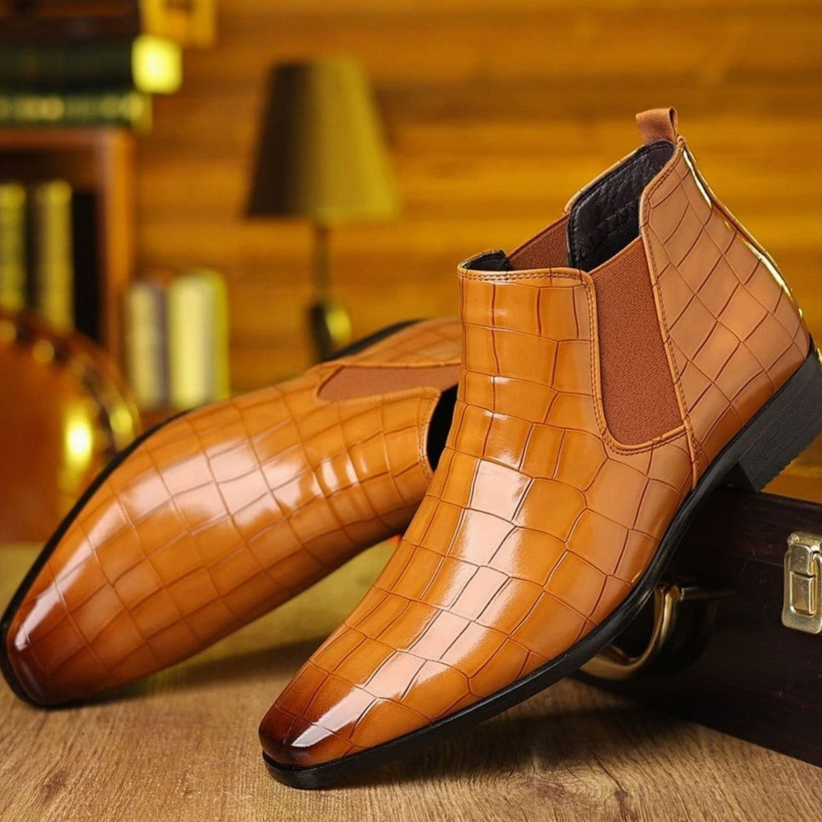 Tan croc-embossed leather Chelsea boots with elastic side panels and pointed toe