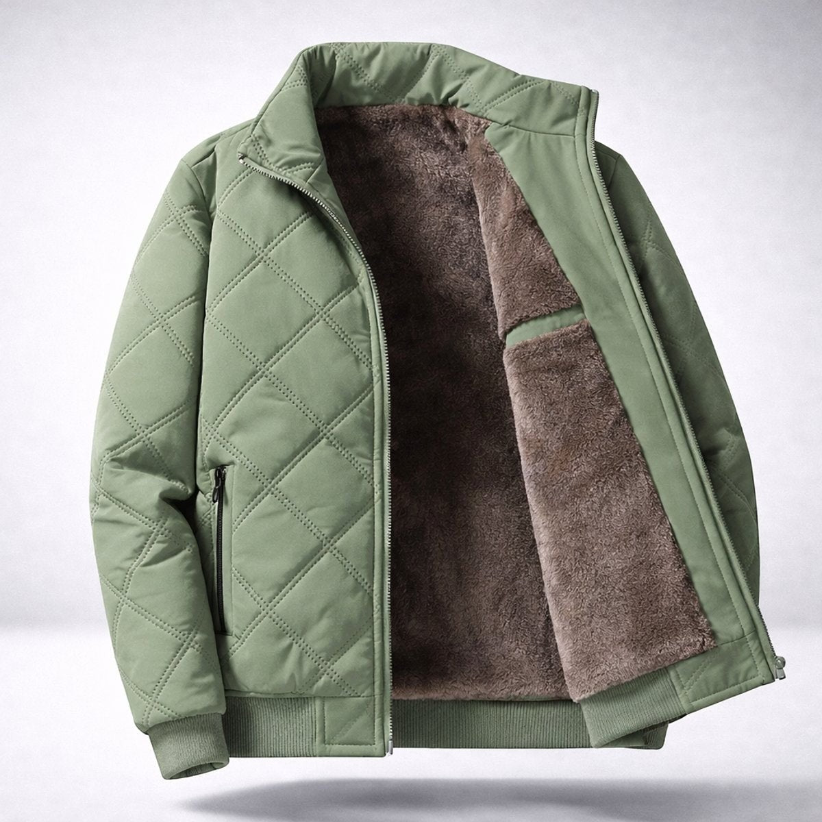 Sage green quilted bomber jacket unzipped to reveal brown fleece interior